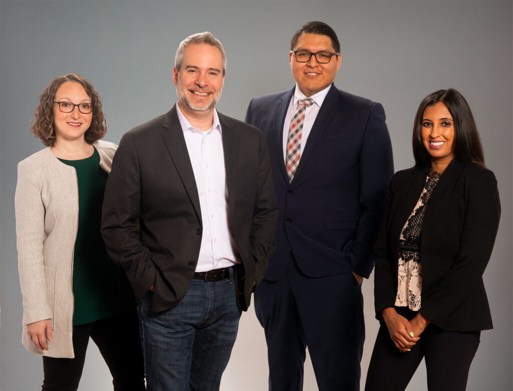 studio shot of partners and associates